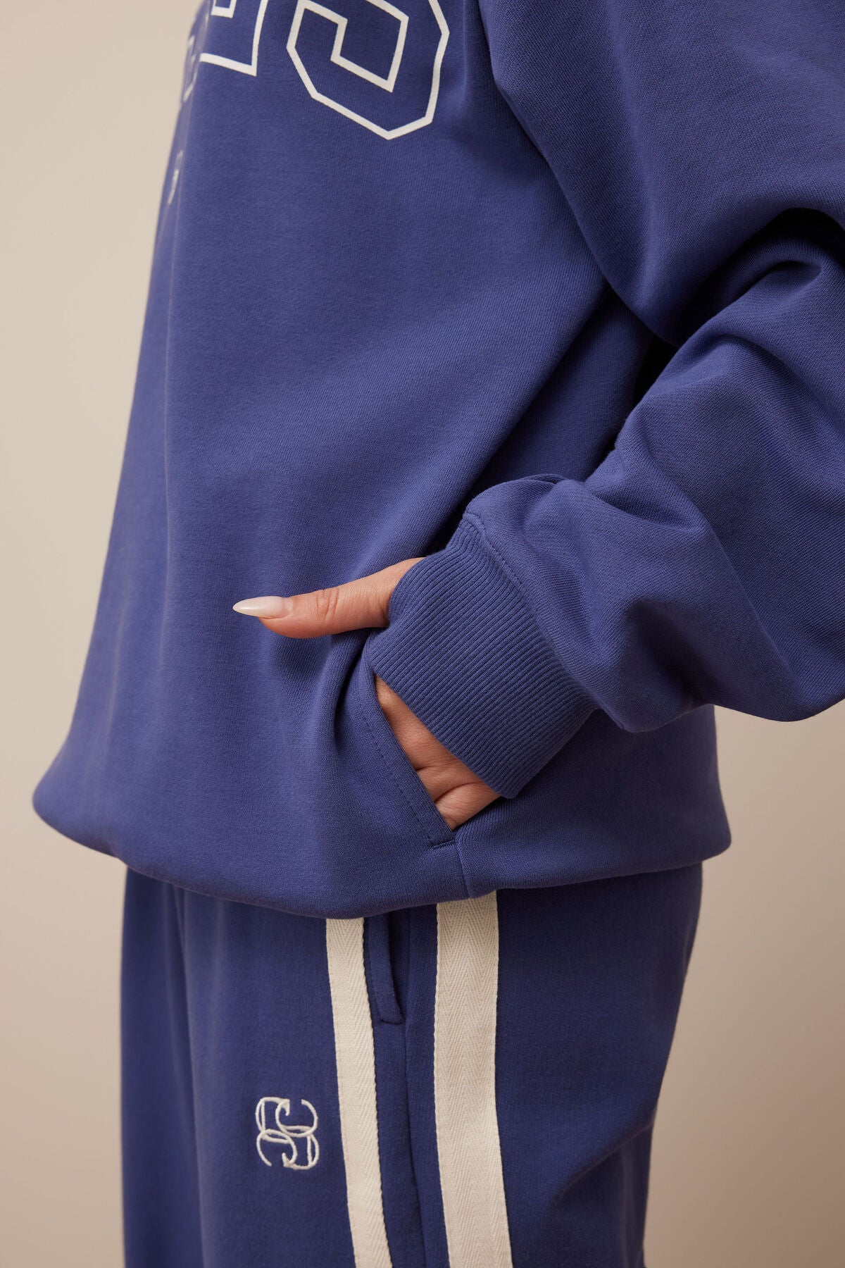 Isla Oversized Slouchy Crew in washed navy white heritage logo.