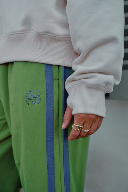 Romy Crew in  buff pistachio club logo