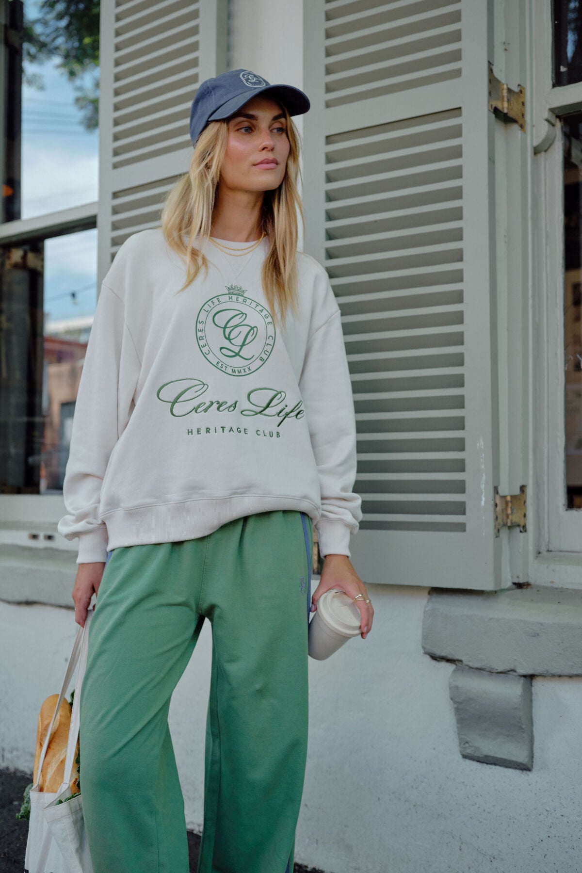 Romy Crew in  buff pistachio club logo