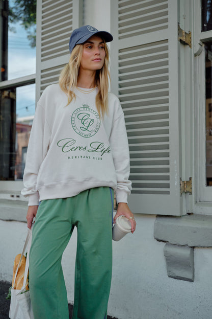 Romy Crew in  buff pistachio club logo