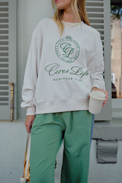 Romy Crew in  buff pistachio club logo