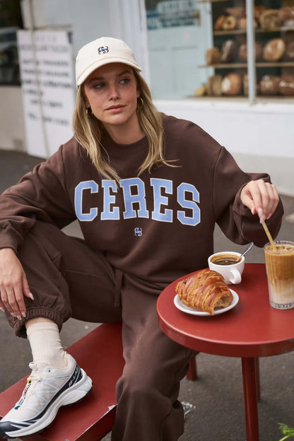 Isla Slouchy Crew in Brunette Brown Buff Sky Blue Heritage Logo by Ceres Life