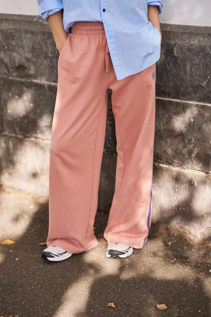 GIGI WIDE LEG TERRY TRACK PANT IN PINK CLAY WASHED NAVY SIDE STRIPE